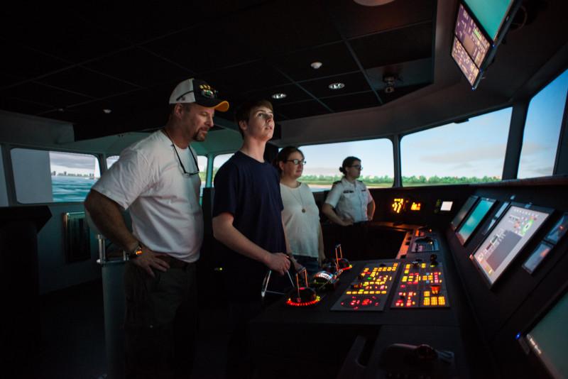 Family in ship simulator